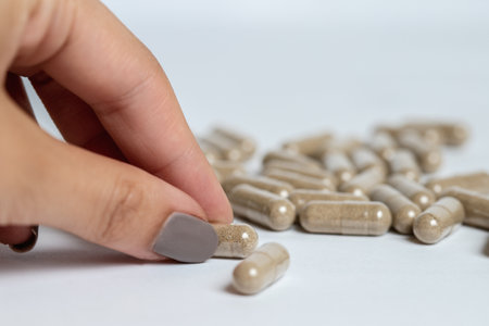 Vitamine E capsules on a white background. Alternative herbal medicine.の写真素材