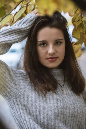 Beautiful young girl enjoying the nature. Gorgeous girl in the nature.の写真素材