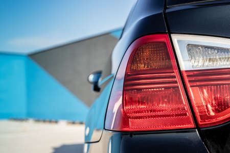 Close up of a backlight. Backlight of a black car.の写真素材