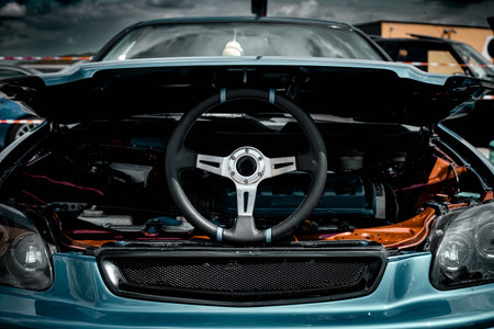 Unique steering wheel on a blue car. Blue car.の写真素材