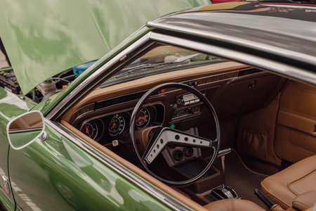 Photo of a car's inside. Unique wheel. Old tymer inside.の写真素材