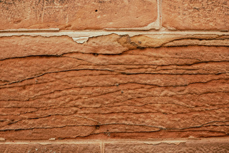 Red stone background  for graphic designs or wallpaper. Interesting texture.の写真素材