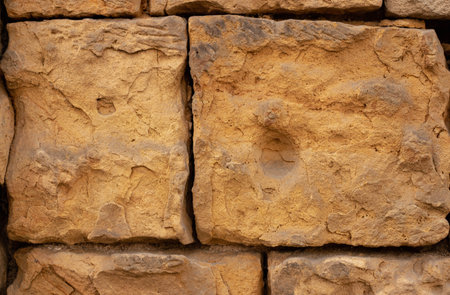 Brown stone background  for graphic design or wallpaper. Interesting texture.