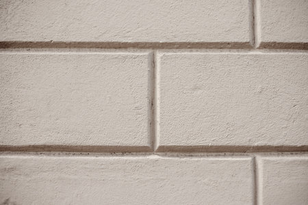 White stone background for graphic design or wallpaper. Interesting texture.の写真素材