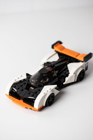 Lego sportcar on a white bacgkround. Unique lego racecar.