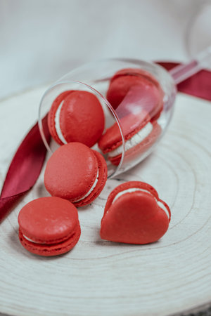 Red macvarons for Valentine's day. Red macarons on a  bright background.の写真素材
