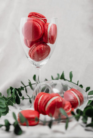 Red macvarons for Valentine's day. Red macarons on a  bright background.の写真素材