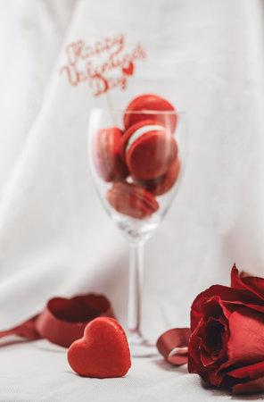 Red macarons for Valentine's day on a bright background.の写真素材