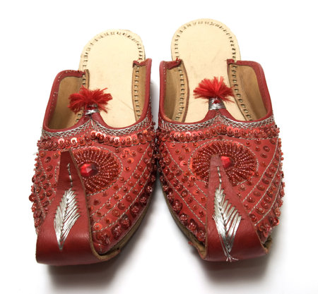 Red Indian sandals. Hand made.の写真素材