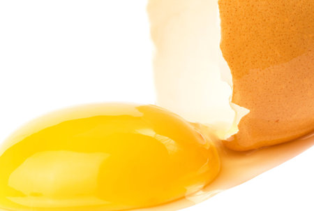 Broken egg isolated on white background 