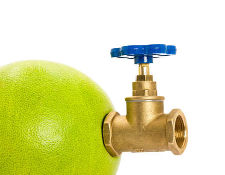 Pomelo with water tap isolated on white background の写真素材