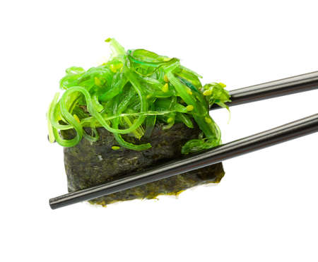 Japanese fresh maki sushi with green seaweed の写真素材