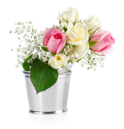 Beautiful Roses in metallic bucket isolated on white backgroundの写真素材