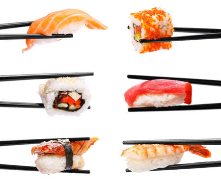 Sushi with chopsticks の写真素材