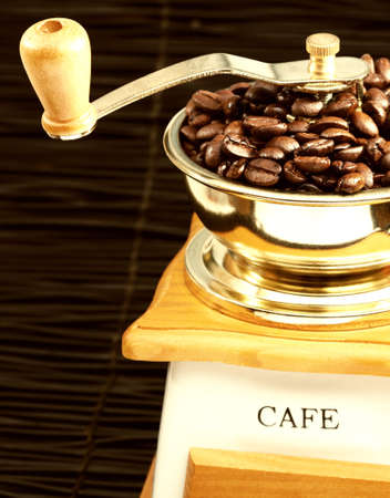 a coffee mill isolated on black.の写真素材