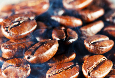 Coffee beans with smoke. Macro.の写真素材