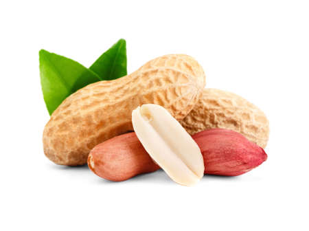 Peanuts and shell with green leaf. Isolated on a white background.の写真素材