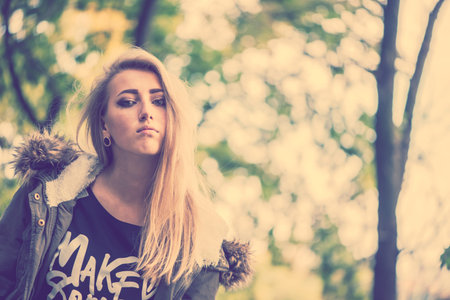 Girl in the park. autumn timeの写真素材