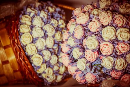 Background of beautiful paper roses bouquetの写真素材
