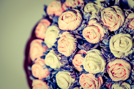 Background of beautiful paper roses bouquetの写真素材