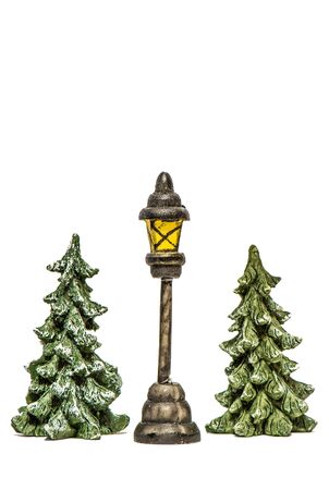 Christmas trees with lantern on white background isolatedの写真素材