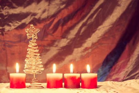 Christmas decoration with candles and treeの写真素材