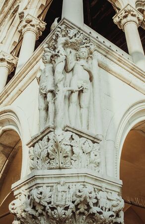 Part of ancient wall with monuments, vintage colour, venice, italyの写真素材