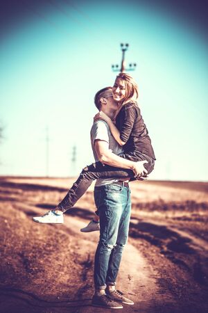 Girlfriend with her boyfriend outdoor in the forestの写真素材