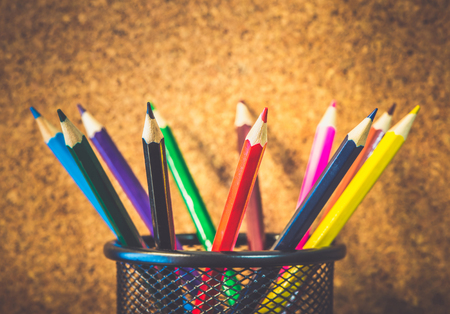 Closeup photo of colorful pencils on woode backgroundの写真素材