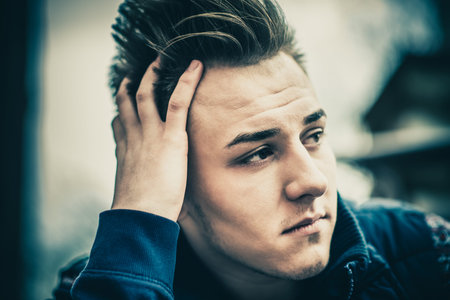 Portrait of the young men outdoorの写真素材