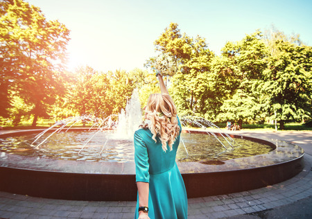Beautiful and happy bride outdoor in the parkの写真素材