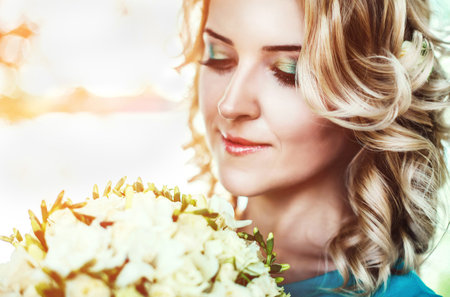 Beautiful and happy bride outdoor in the parkの写真素材