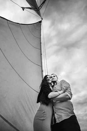 Pretty couple relaxing outdoor on the  yachtの写真素材
