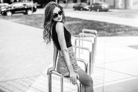 Pretty young woman walking in the parkの写真素材
