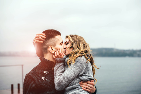 Young happy couple have fun outdoor in the parkの写真素材