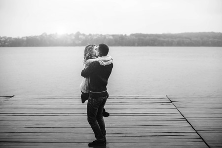 Young happy couple have fun outdoor in the parkの写真素材