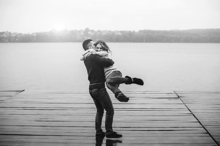 Young happy couple have fun outdoor in the parkの写真素材
