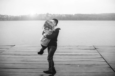 Young happy couple have fun outdoor in the parkの写真素材