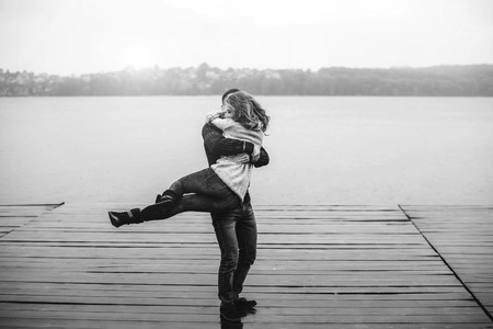 Young happy couple have fun outdoor in the parkの写真素材