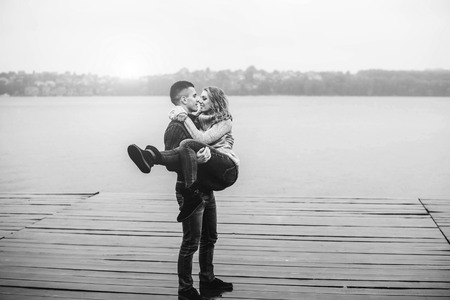 Young happy couple have fun outdoor in the parkの写真素材