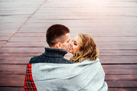 Young happy couple relaxing outdoor in the parkの写真素材