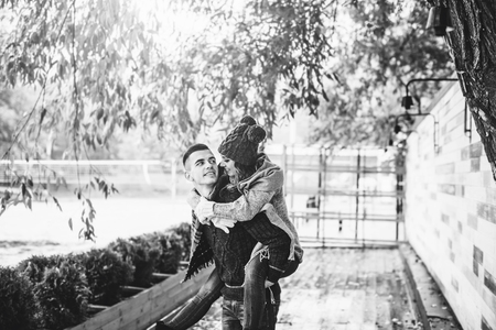 Young happy couple have fun in the parkの写真素材