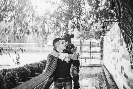 Young happy couple have fun in the parkの写真素材