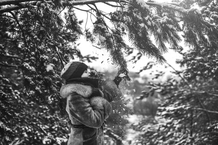 Portrait of young pretty girl walking outdoorの写真素材