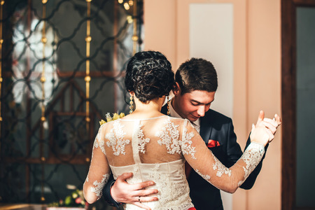 Happy wedding couple dancing on wedding ceremonyの写真素材