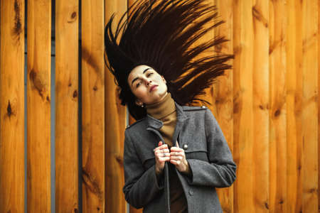 Young brunette woman outdoor in the parkの写真素材