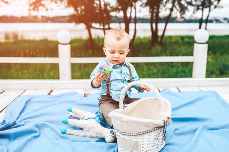 Cute little boy playing outdoor in the parkの写真素材
