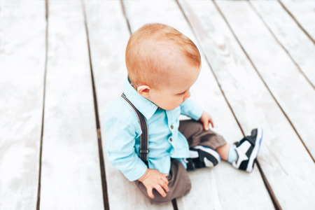 Cute little boy playing outdoor in the parkの写真素材