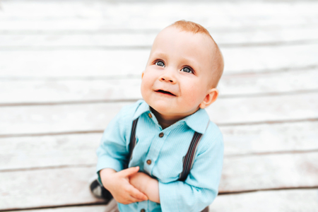 Cute little boy playing outdoor in the parkの写真素材