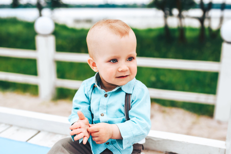 Cute little boy playing outdoor in the parkの写真素材